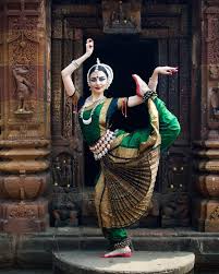 Seema Ladhka Devidasi, formerly Sofya, performing Odissi dance in a temple program in Vrindavan.