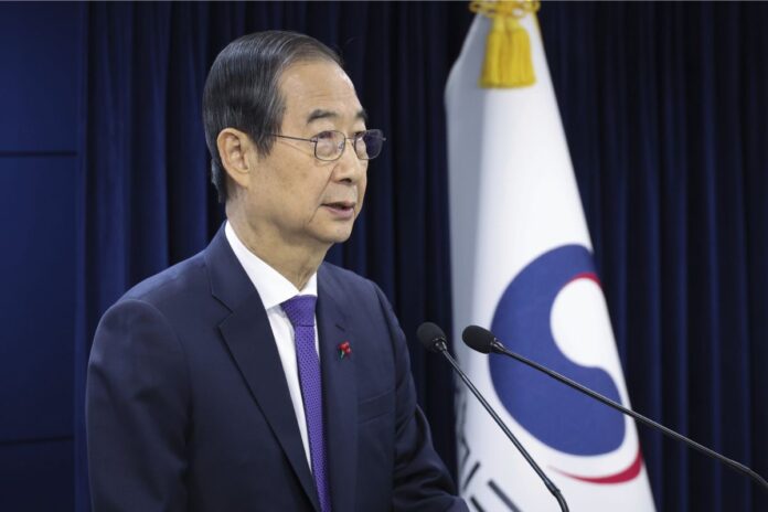 Impeachment Of Acting President Han Duck-Soo Deepens South Korea's Political Crisis